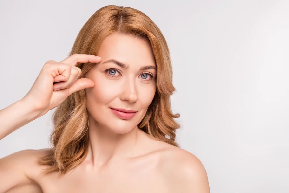 Natural Woman Face with Healthy Flawless Skin and Lifting Arrows over face